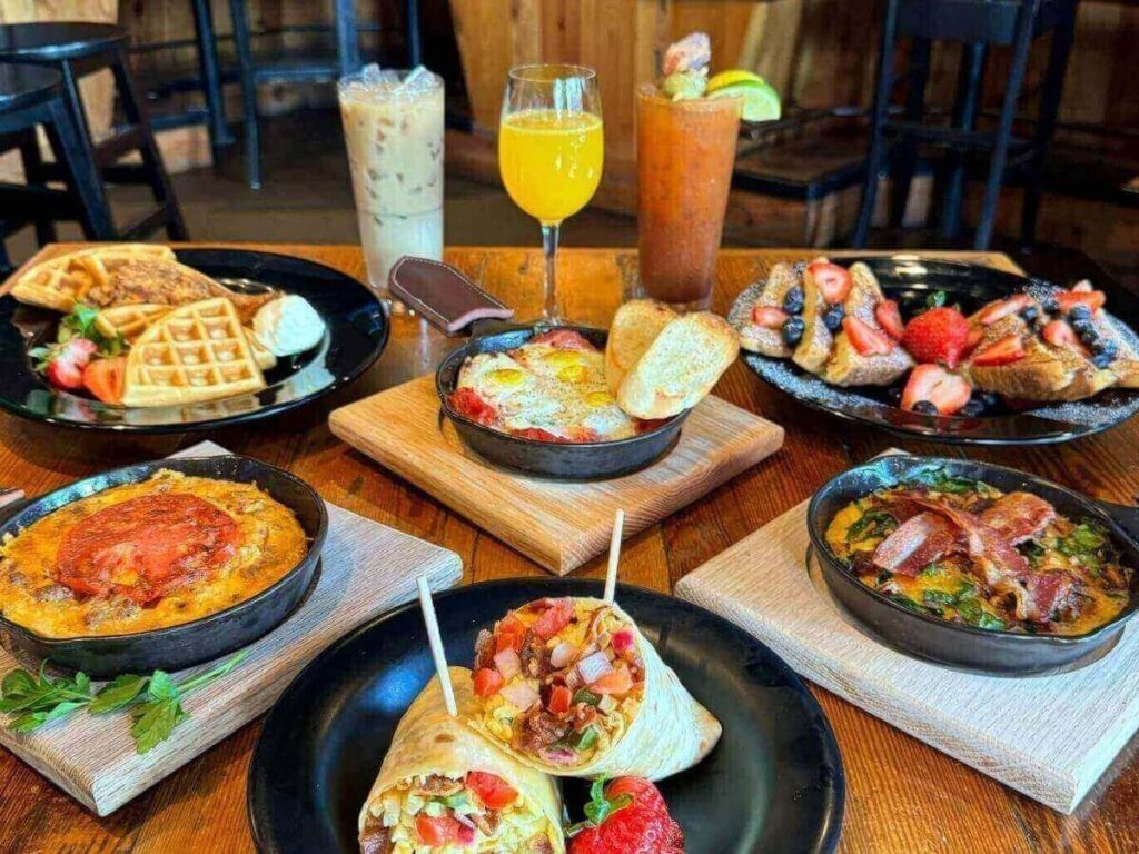 People sitting at a sidewalk coffee shop in the 12South neighborhood of Nashville