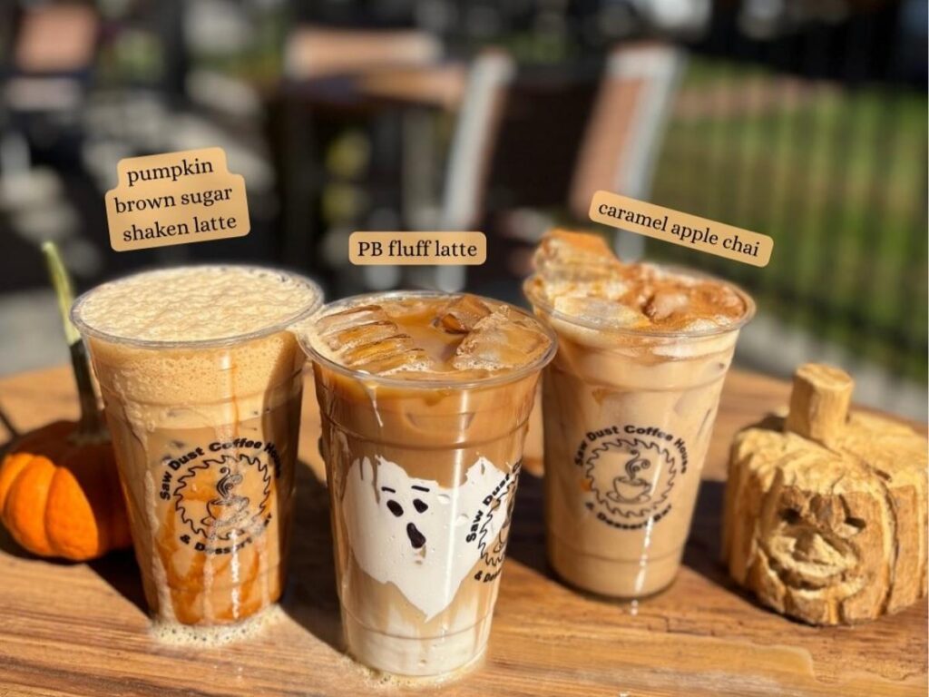 Outdoor seating and latte at Ascension Coffee in Uptown Dallas.