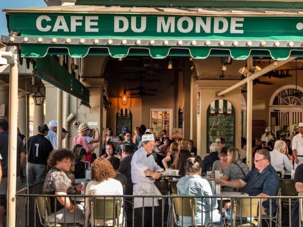 Fresh beignets and café au lait at Café du Monde in New Orleans