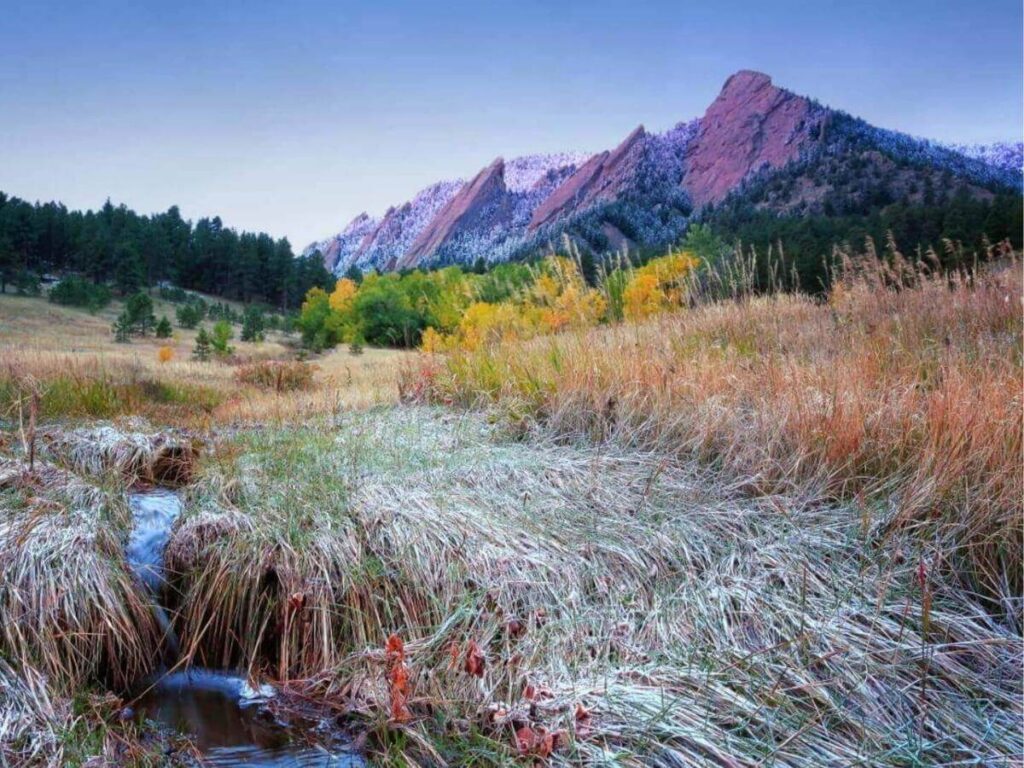 Hiking trail at Chautauqua Park with the Flatirons in the background