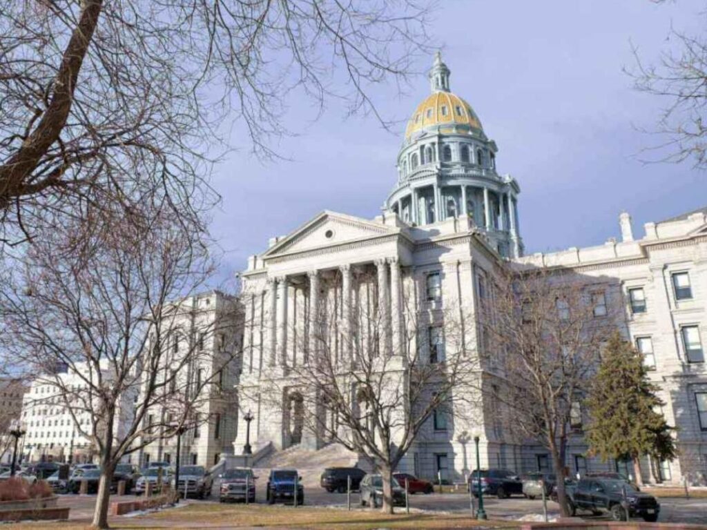 Colorado State Capitol building in Denver with its gold dome shining in sunlight
