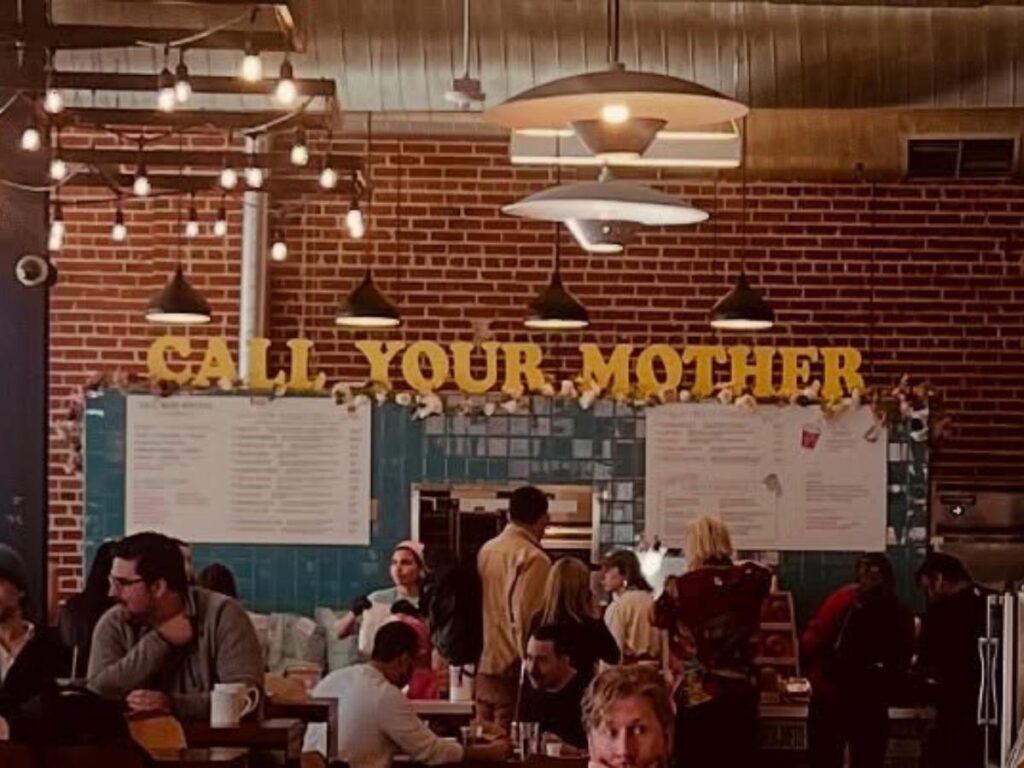 Food stalls and communal seating inside Denver Central Market