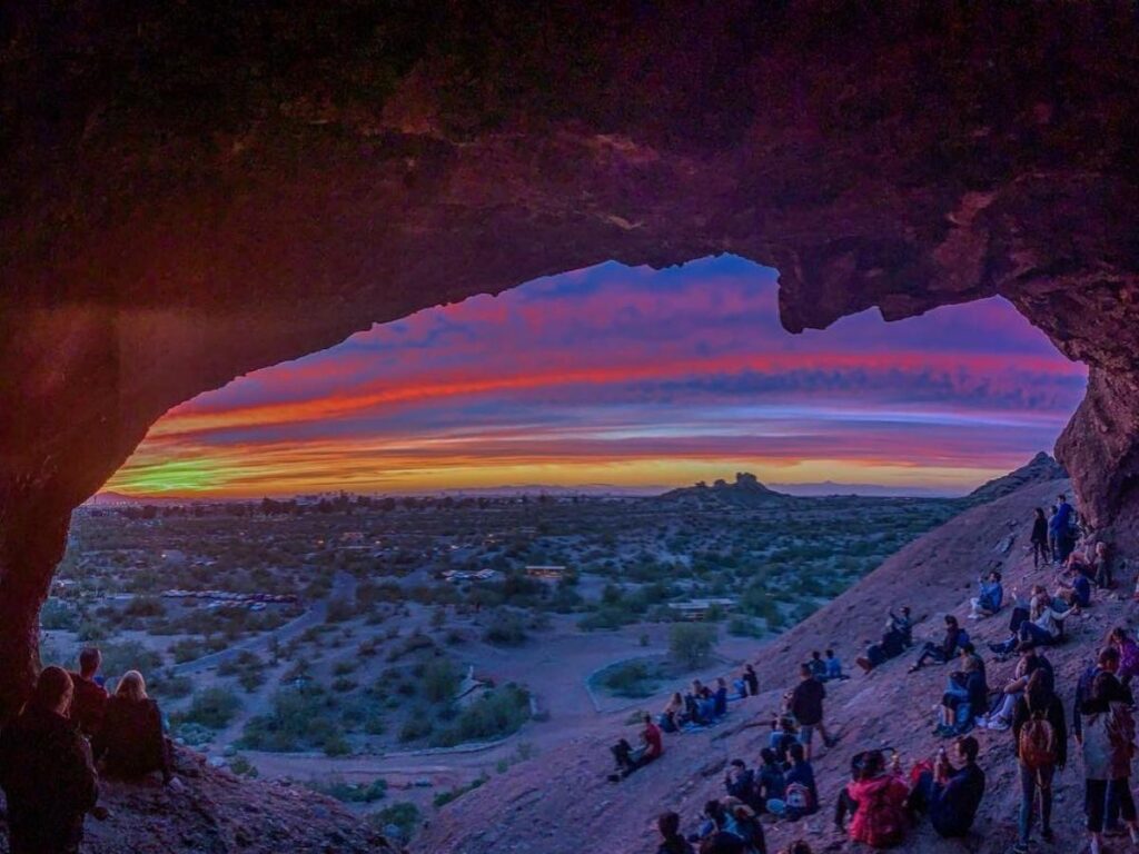Hole in the Rock formation at Papago Park with desert scenery around it