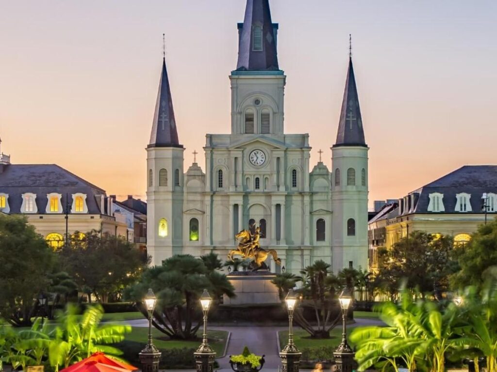 Jackson Square with artists and the St. Louis Cathedral in the background