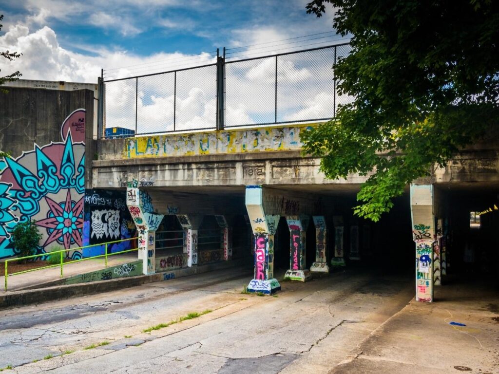 Layered graffiti and colorful murals inside Atlanta’s Krog Street Tunnel along the BeltLine trail