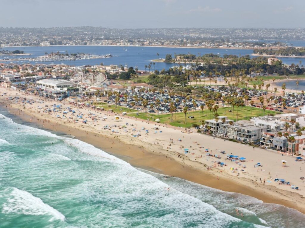 Rollercoaster and boardwalk along Mission Beach in San Diego.