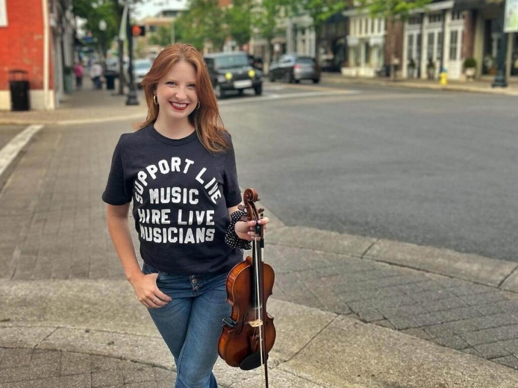 Musicians setting up on Broadway in Nashville during a quiet morning