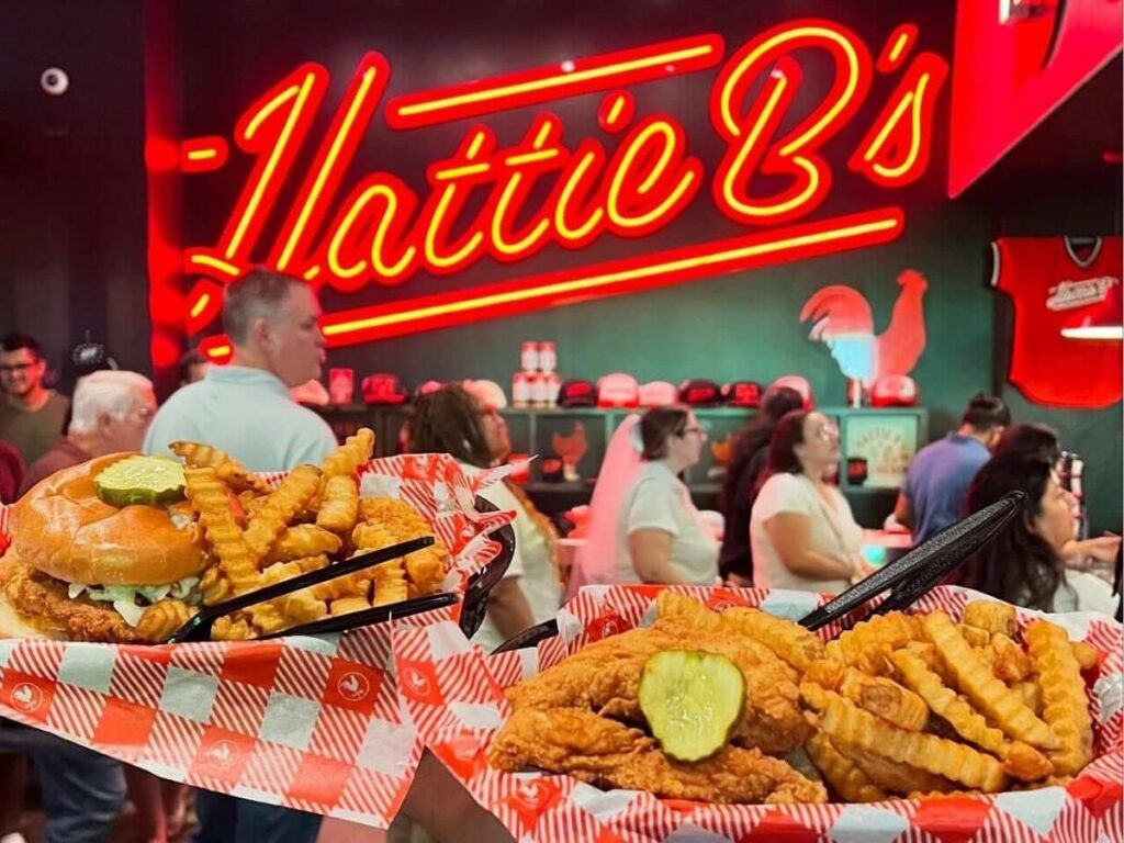 Inside a casual Nashville hot chicken restaurant with customers ordering