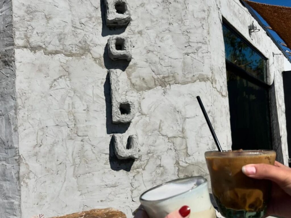 Relaxed morning in a Nashville neighborhood with cafés and tree-lined sidewalks