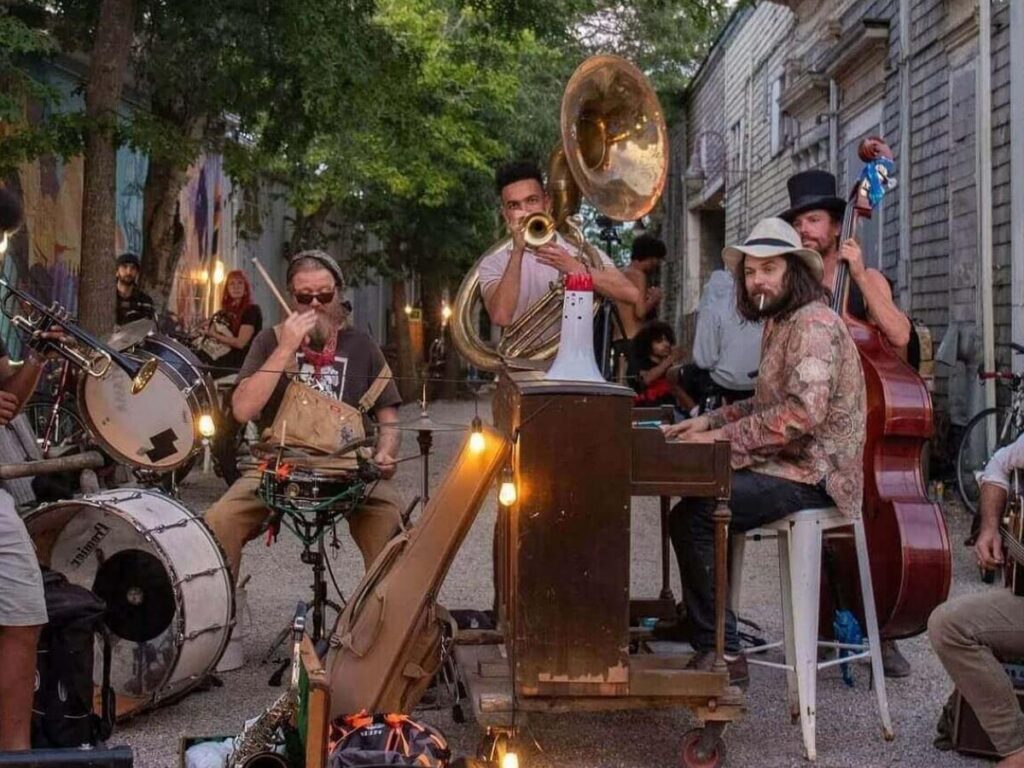 A street musician playing jazz in New Orleans during the early morning hours