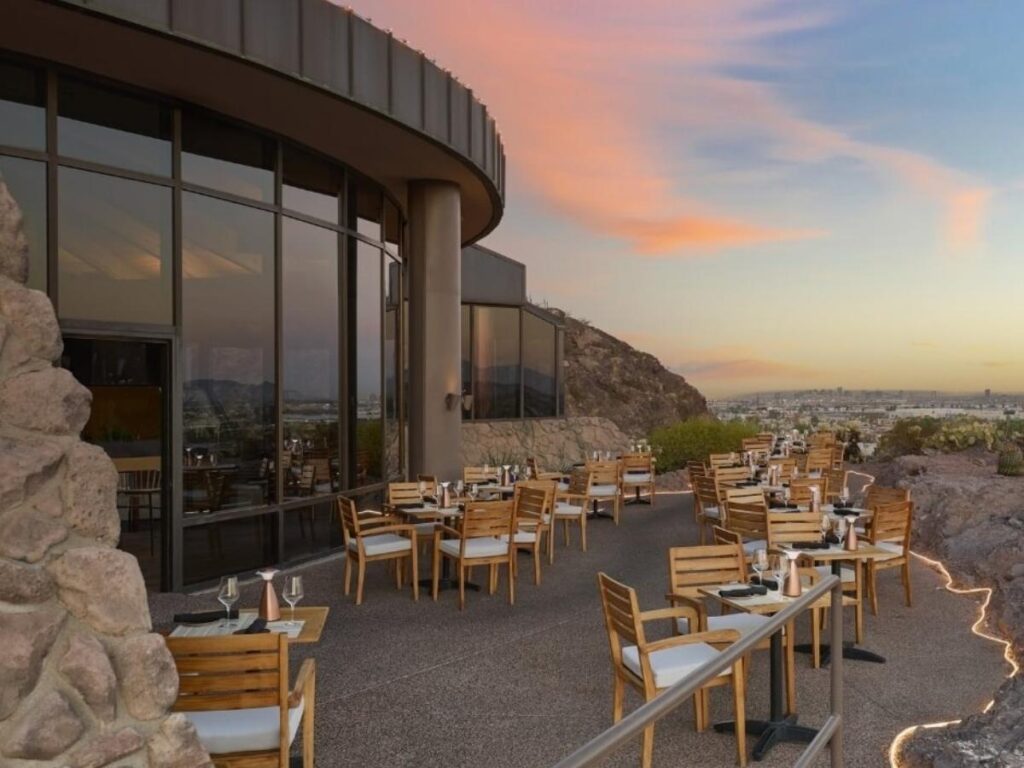 Quiet afternoon at a Phoenix resort with shaded seating and desert surroundings