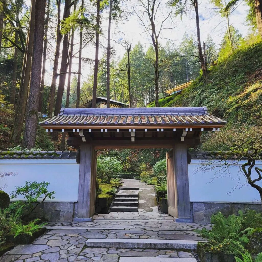 Tranquil scene at Portland Japanese Garden with stone path and lush greenery