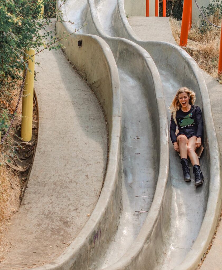 Seward Street Slides in Noe Valley with person riding down
