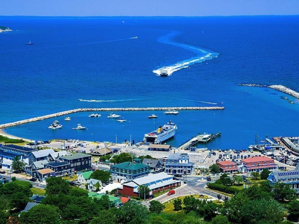 Block Island ferry arriving at Old Harbor with town in the background.
