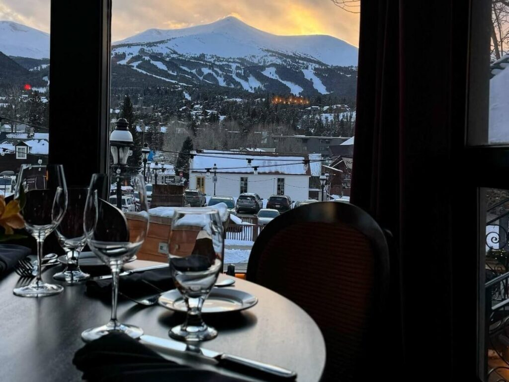 Cozy restaurant along Main Street in Breckenridge on a winter evening