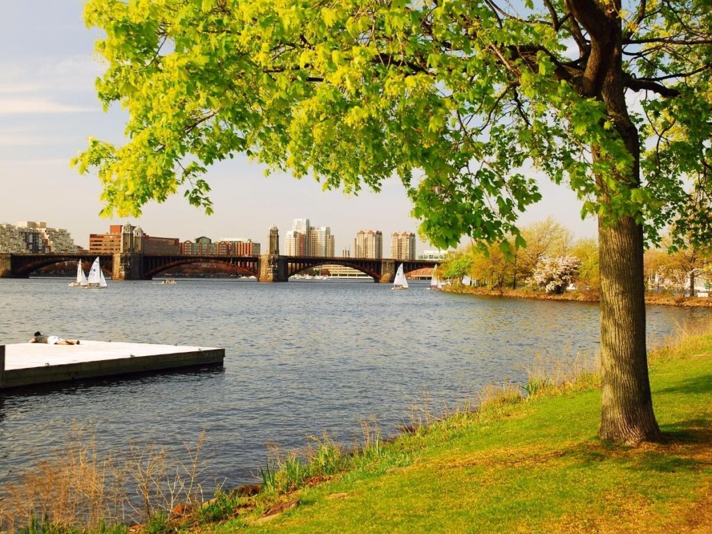 Sunset view from Charles River Esplanade with Boston skyline in the background
