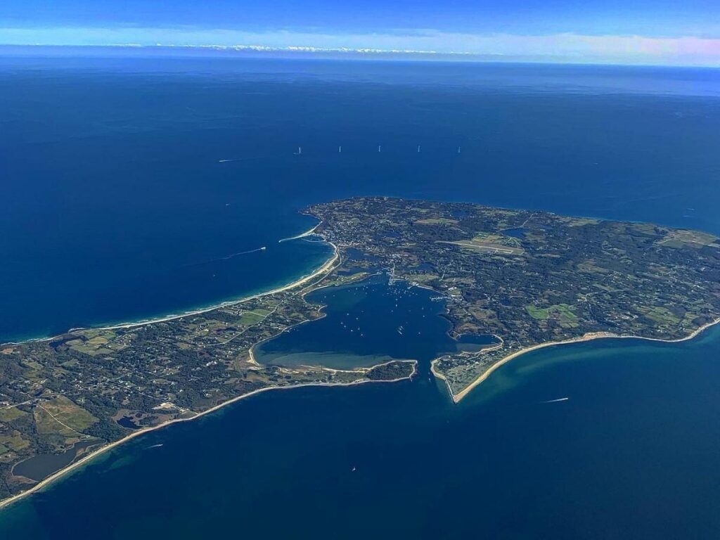 Waves rolling onto soft sand at Mansion Beach on Block Island.