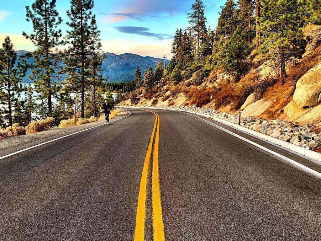 Scenic drive along Highway 89 with views of Lake Tahoe and surrounding cliffs
