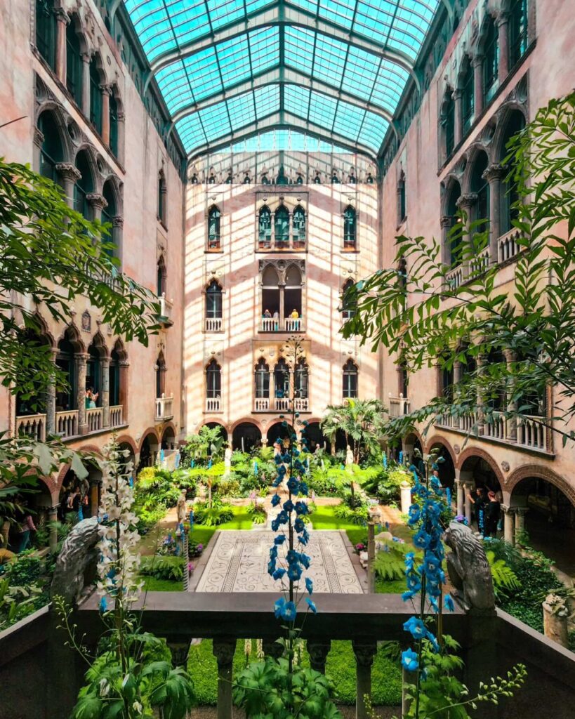 Lush garden courtyard inside Isabella Stewart Gardner Museum in Boston