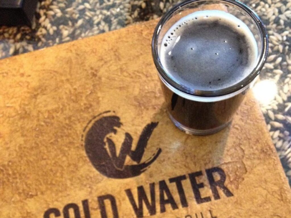 Casual outdoor seating at a brewery in Lake Tahoe during the evening