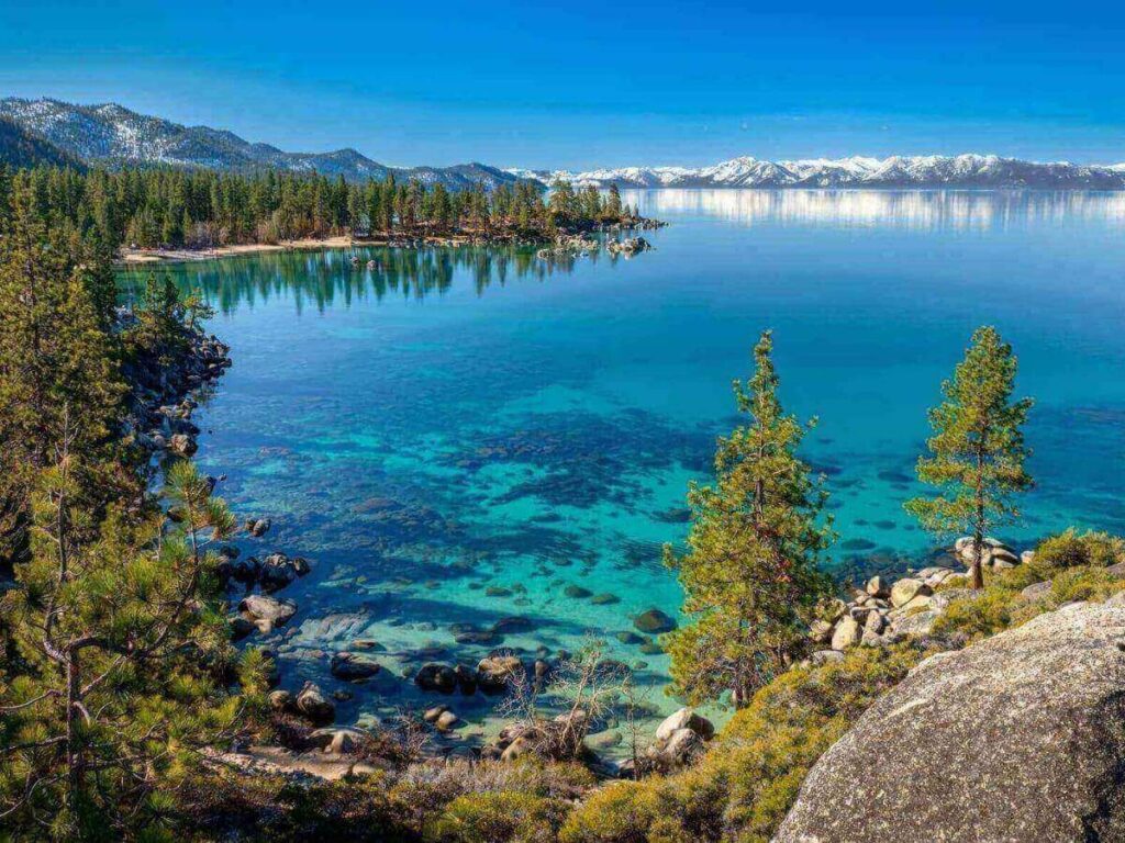Clear water near the shore at Lake Tahoe with stones visible beneath the surface