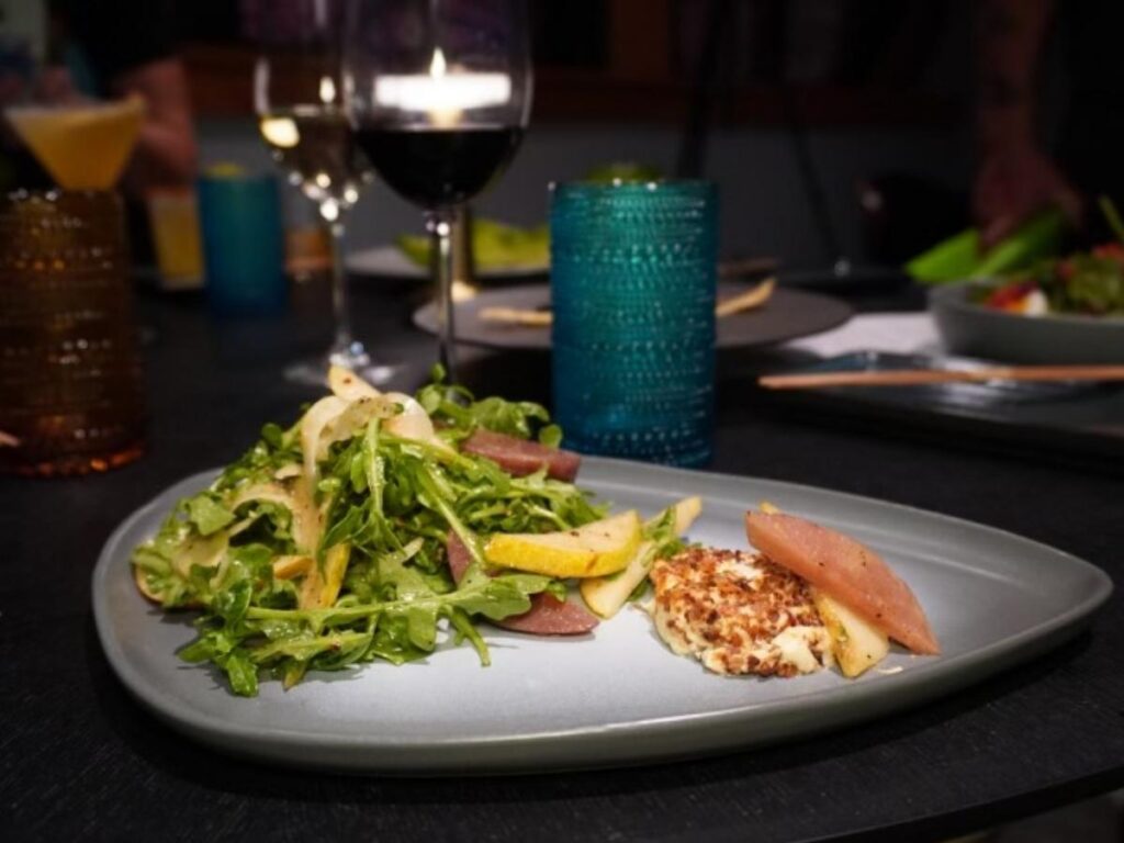 Lakeside patio dining in Lake Tahoe with water views and relaxed seating