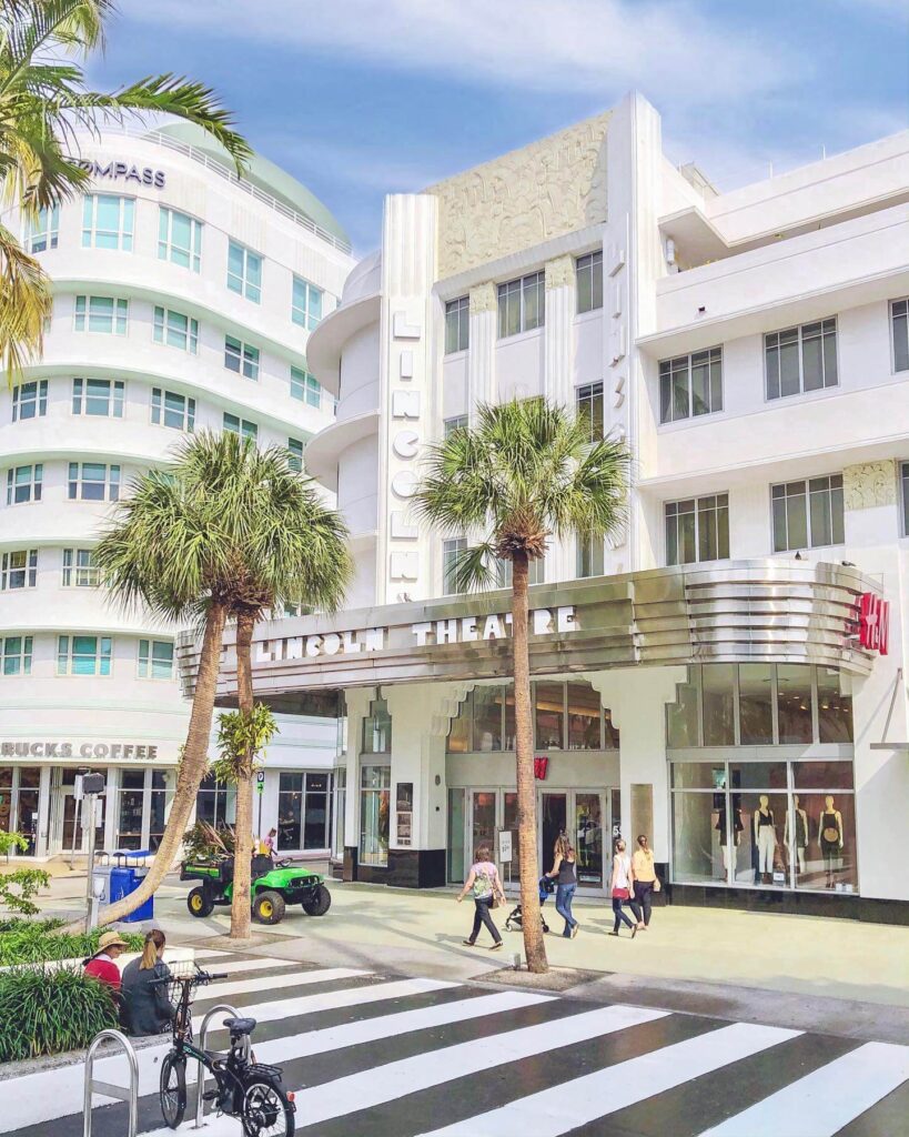 Palm-lined Lincoln Road Mall in South Beach, Miami with shops and outdoor cafes