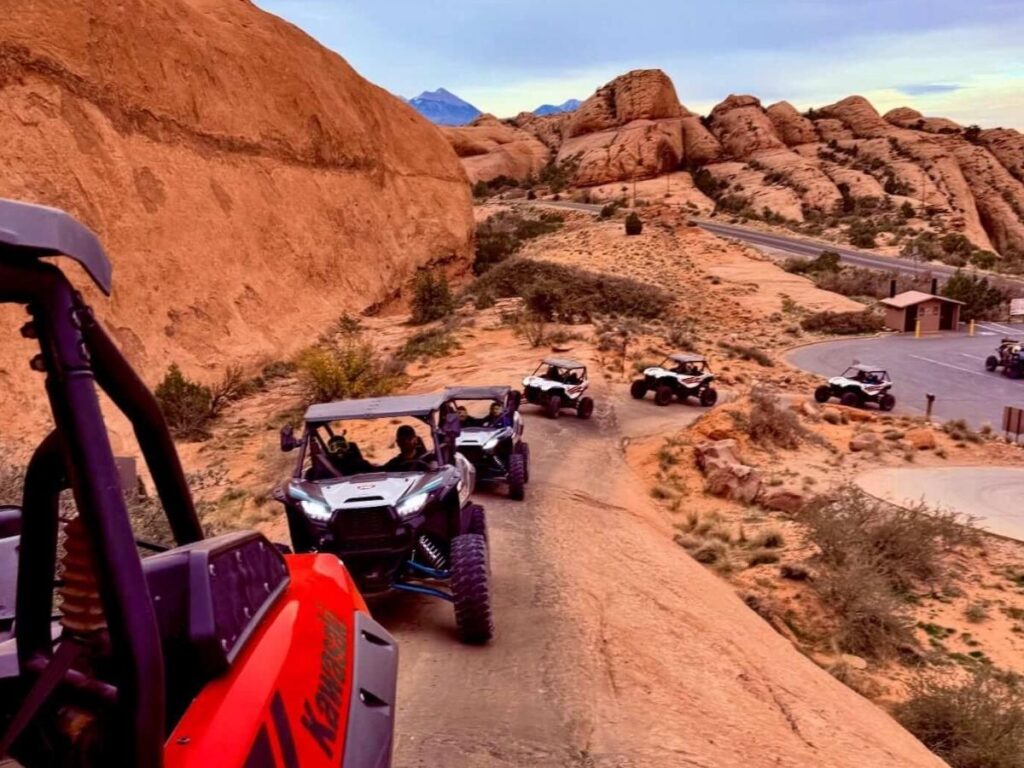 Jeep navigating a rocky off-road trail near Moab, Utah