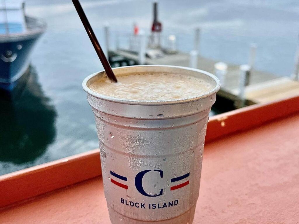 Iced coffee and a pastry on a table in Old Harbor on Block Island.