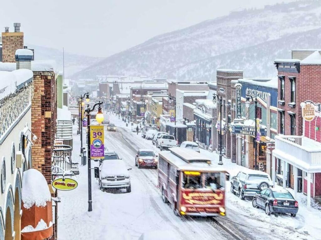 Quiet winter morning on Park City Main Street with snow and historic buildings