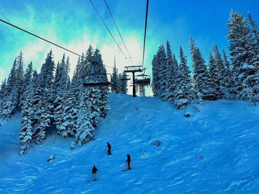 Scenic chairlift ride in Park City with wide mountain views