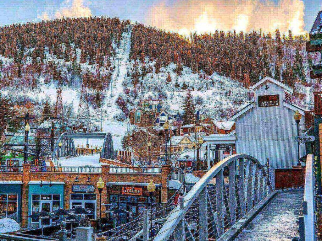 Winter evening in Park City with snow and warm lights