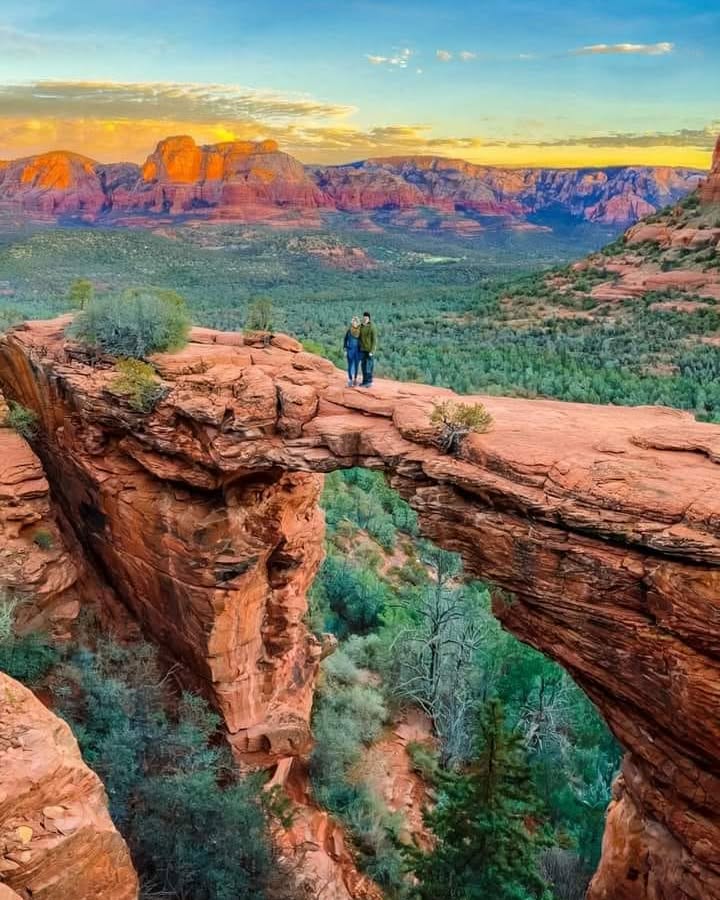Red Rock Pass information sign and parking kiosk at a Sedona trailhead in Coconino National Forest
