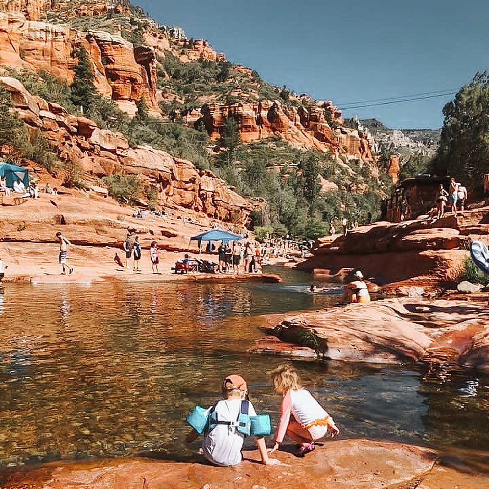 Visitors cooling off at Slide Rock State Park during summer in Sedona