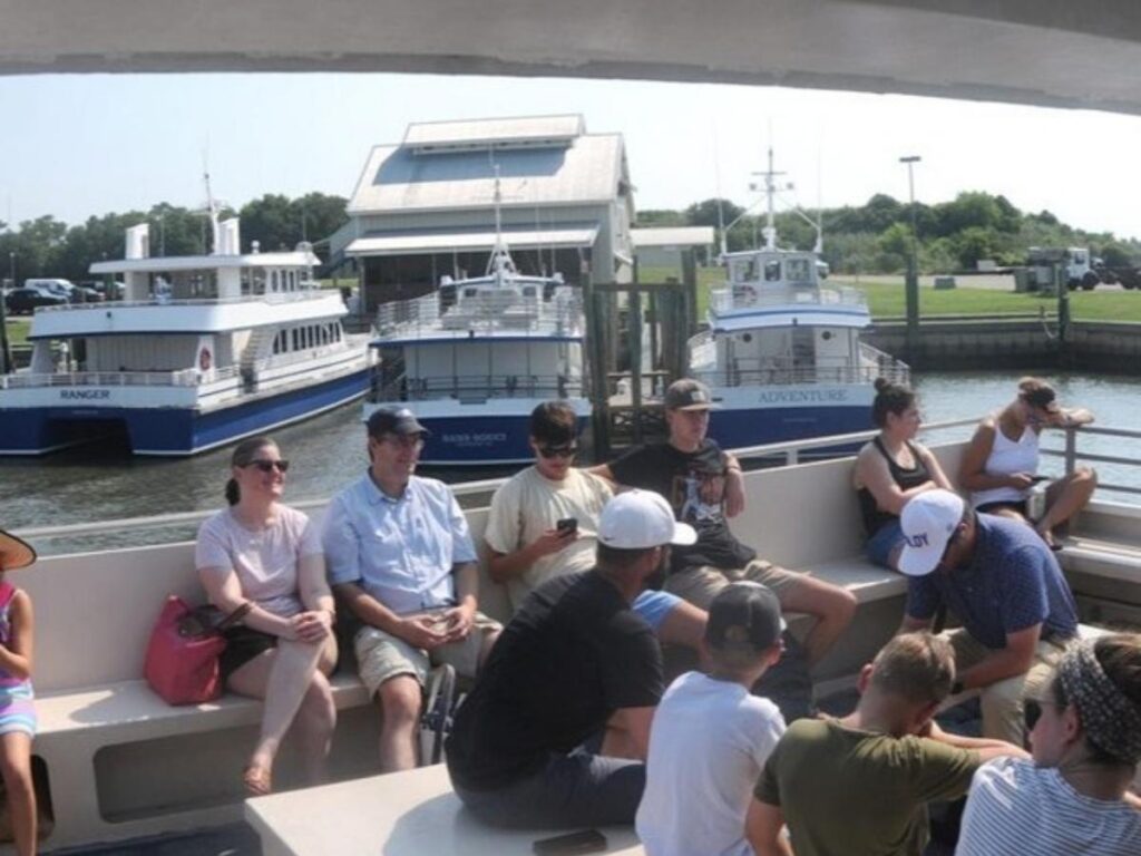 Travelers checking in at the Bald Head Island ferry terminal in Southport