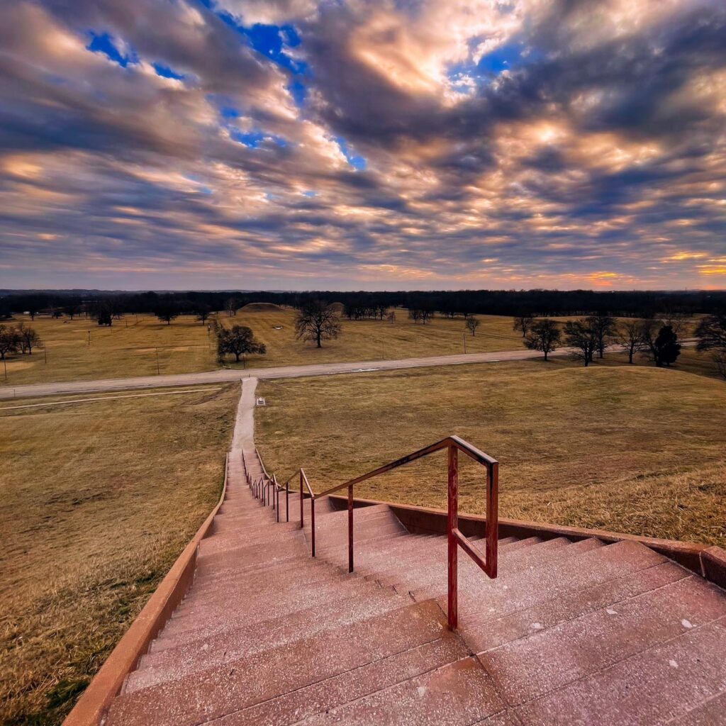 View from the top of Monk’s Mound with trails and the St. Louis skyline in distance