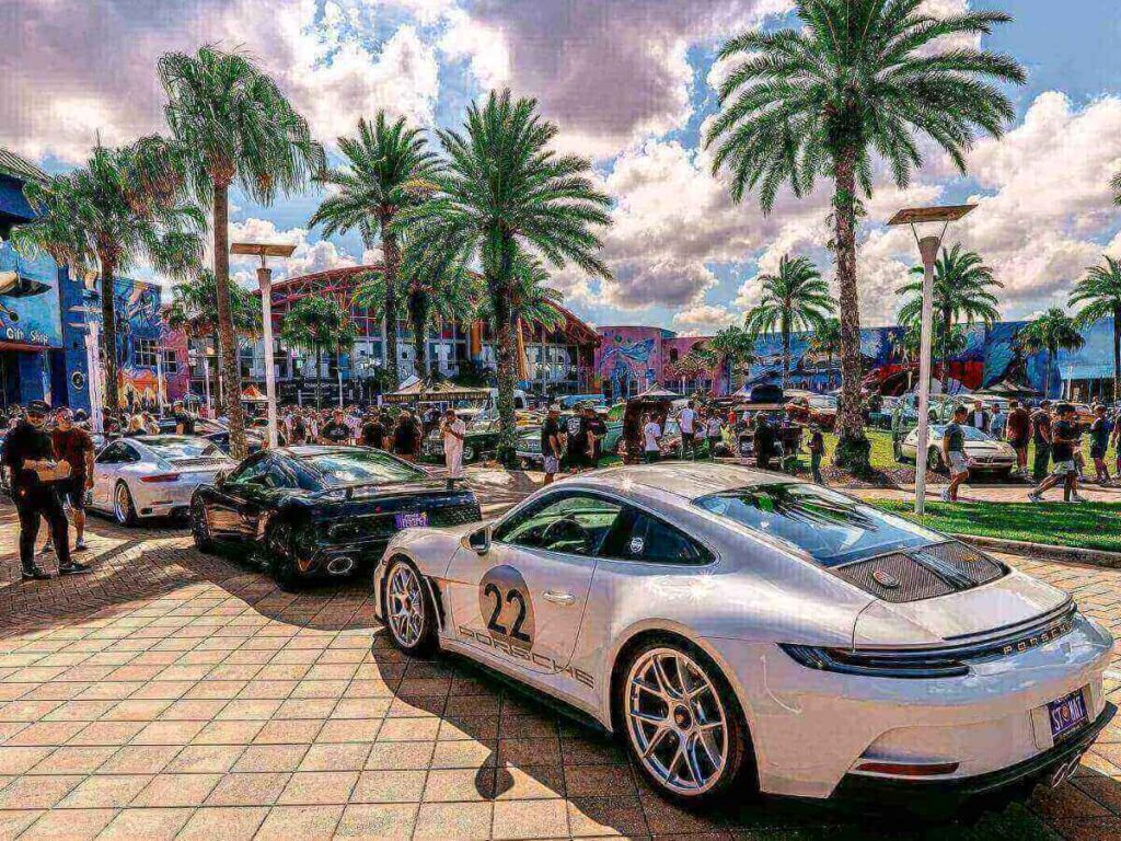 Car driving along a palm-lined road in Orlando on a sunny day