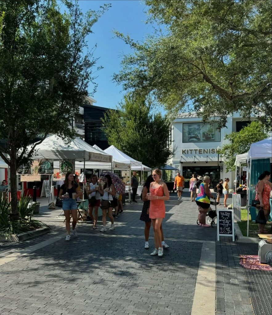 Shaded pedestrian walkway in Hyde Park Village with boutiques and cafes in Tampa