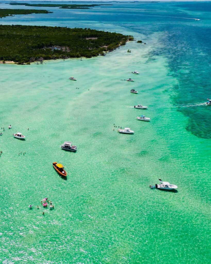 Beach and water activities in Key West including snorkeling and sailing