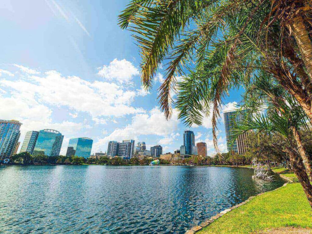 Lake Eola Park in downtown Orlando with walking path and skyline in the background