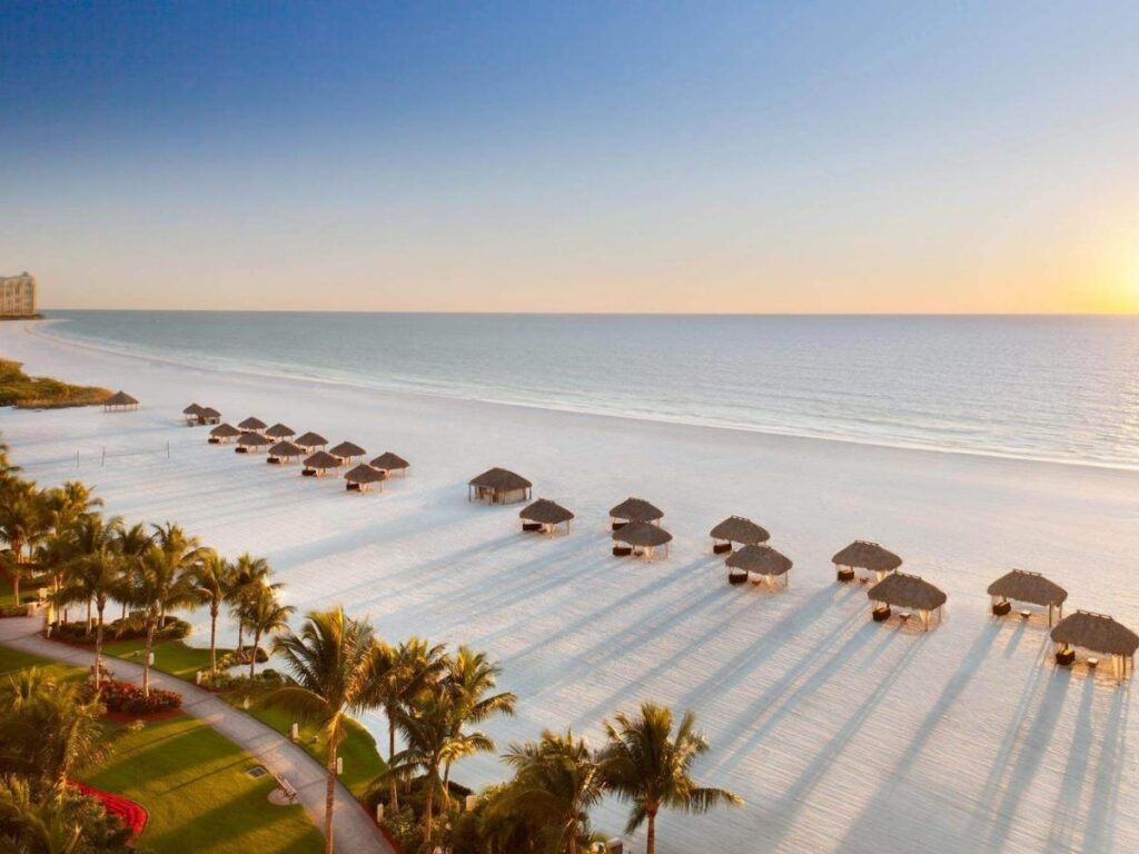 Quiet morning on a Marco Island beach with soft light and empty shoreline