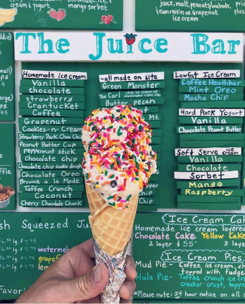 Homemade ice cream cone from The Juice Bar in Nantucket with waffle cone and sprinkles.