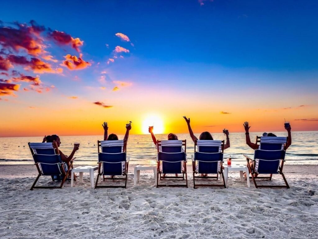 Early morning walk along South Marco Beach with smooth sand and calm water