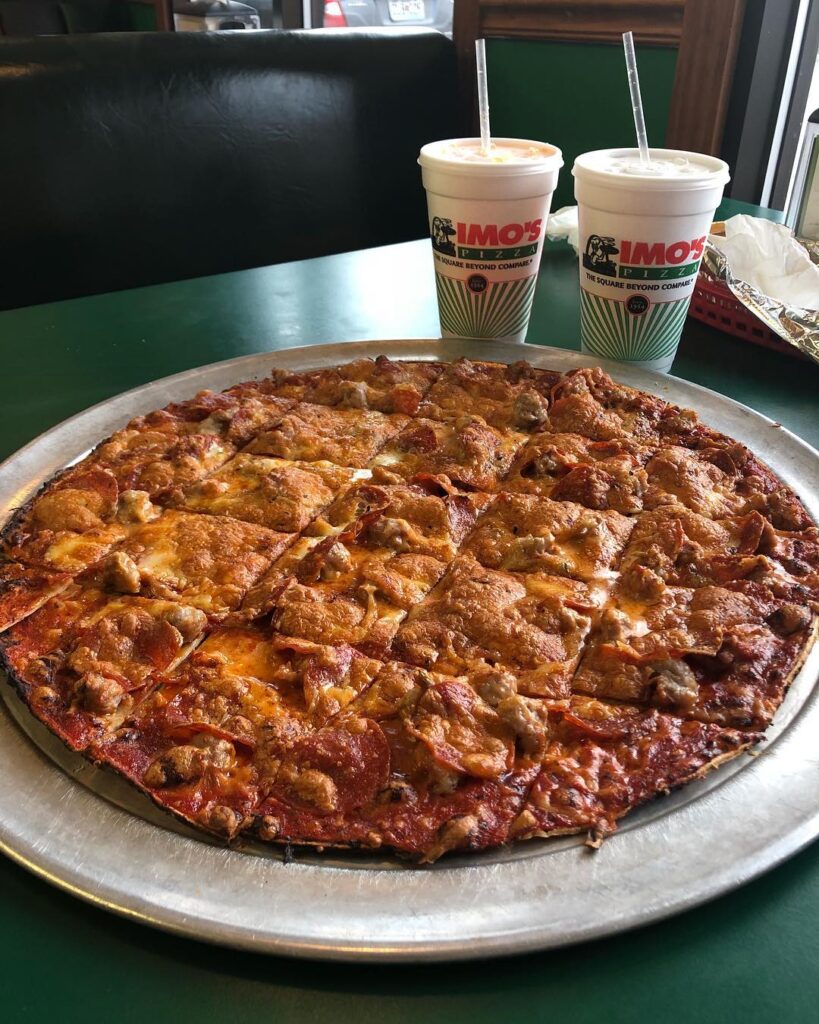 Close-up of St. Louis-style pizza with square slices