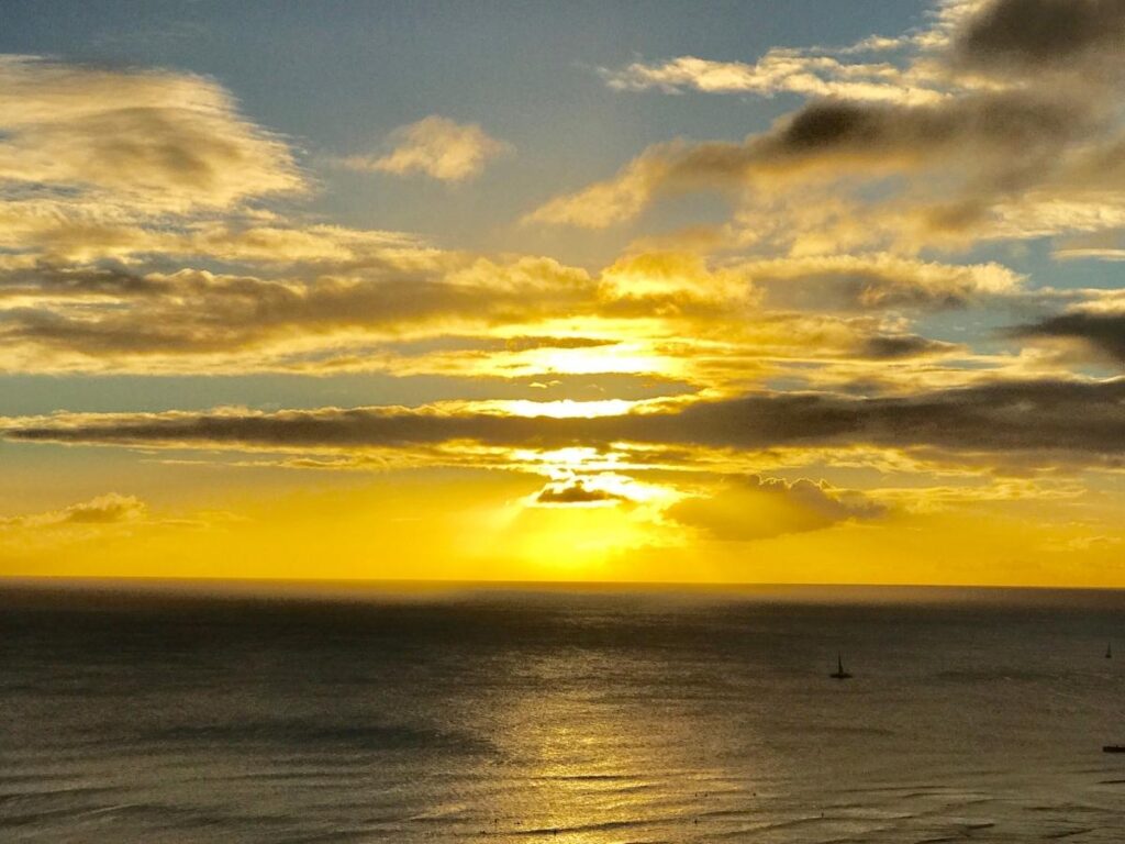 Vibrant sunset sky over Waikiki Beach