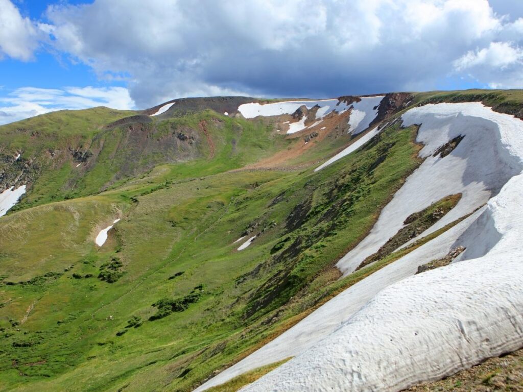 Alpine Visitor Center surrounded by tundra landscape along Trail Ridge Road.