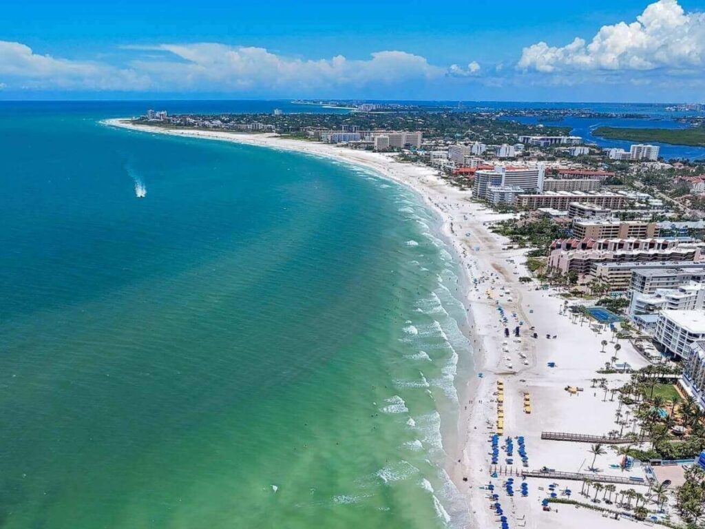 Soft white sand and calm water at Siesta Key Beach in Sarasota, Florida on a quiet morning
