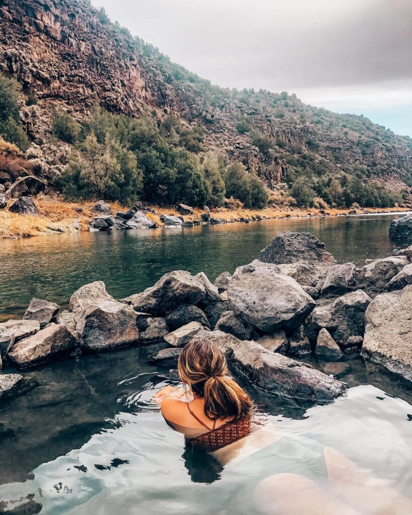 Natural hot spring pool next to the Rio Grande river near Taos, New Mexico