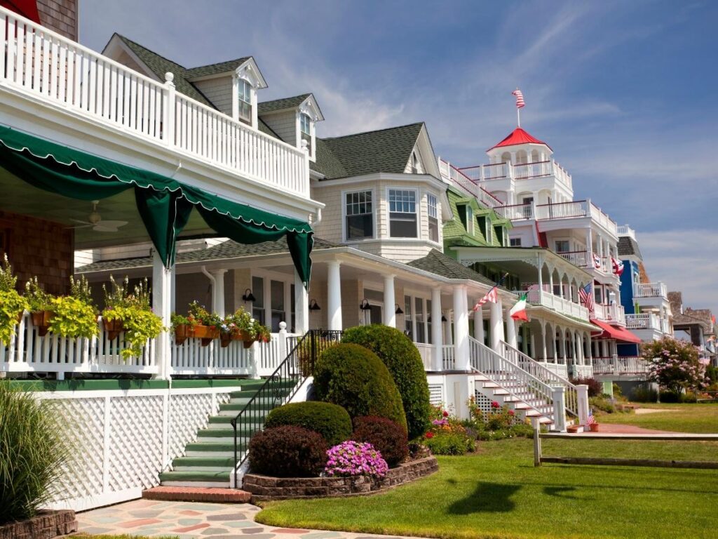 Colorful Victorian-style houses with porches in Cape May, New Jersey.