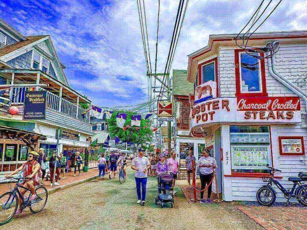Commercial Street in Provincetown in the morning with quiet sidewalks and cafés opening